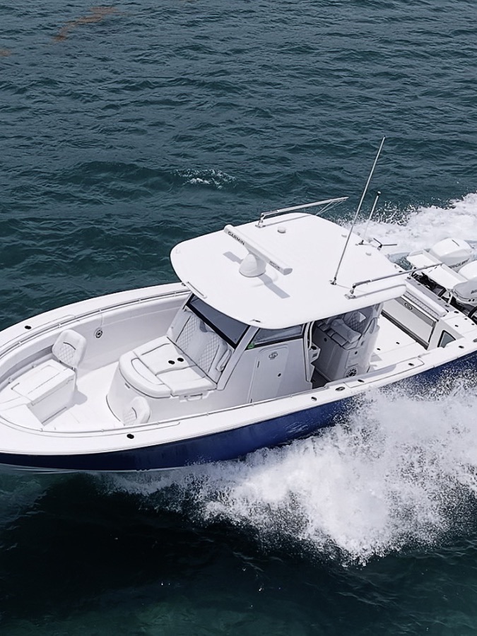 Aerial view of a 35-foot center console running at speed