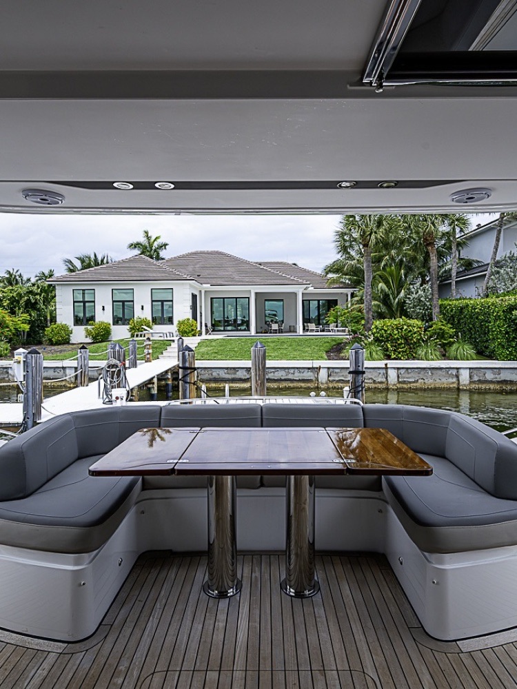 Dining table on the aft deck of a 65-foot yacht