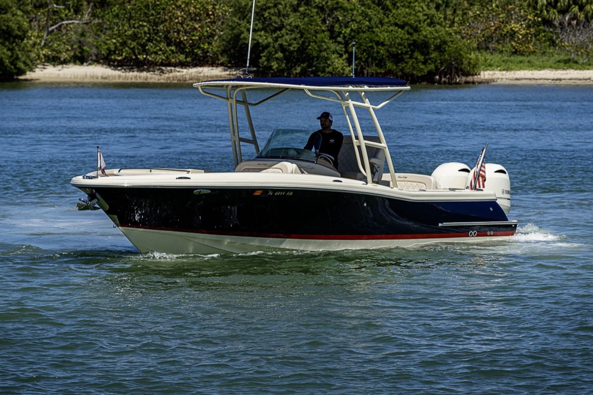 A 26-foot center console under way on open water