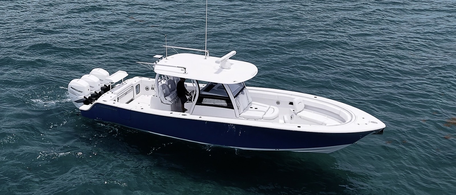 A 35-foot center console under way on open water