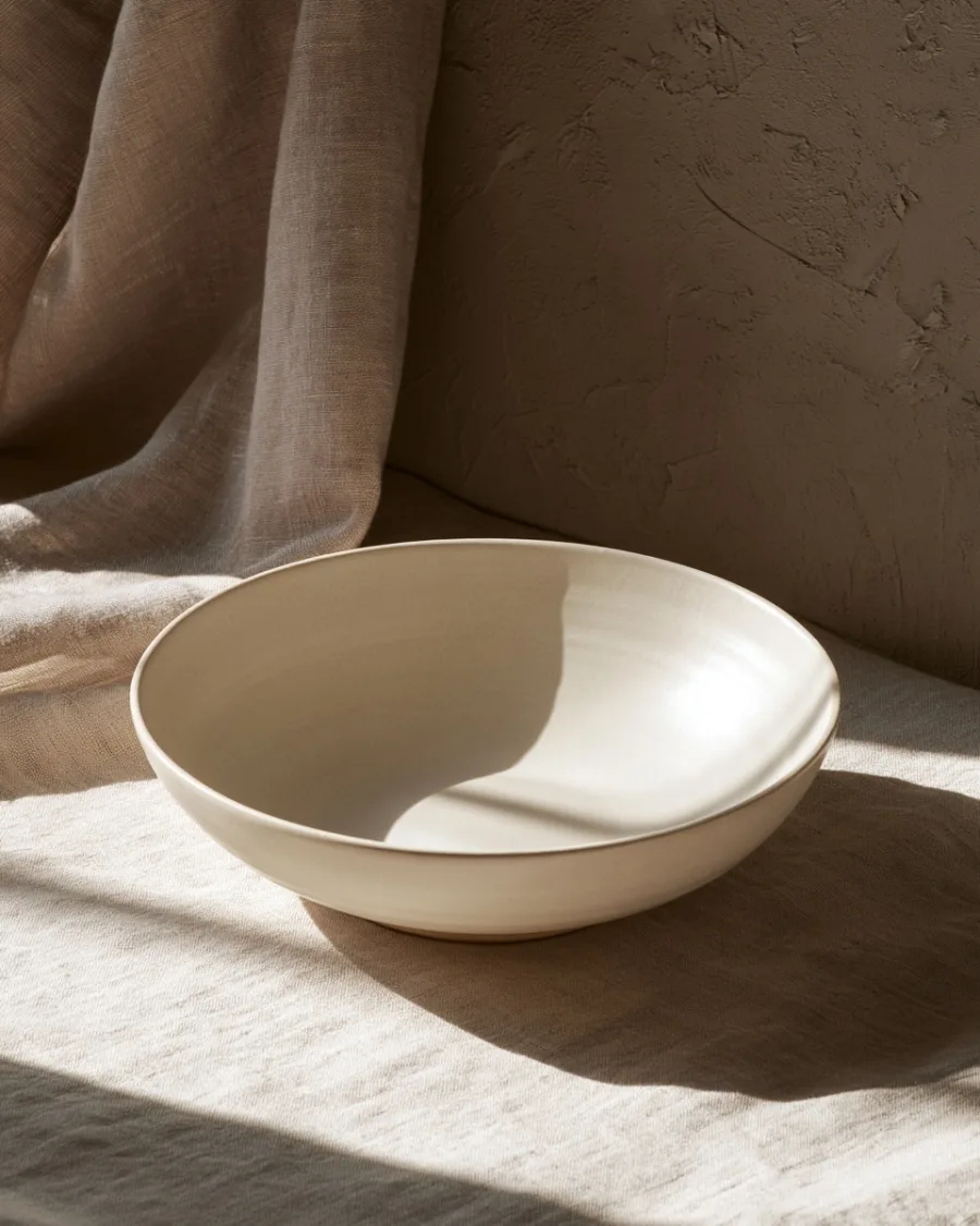Wide shallow chalk-white bowl seen from above