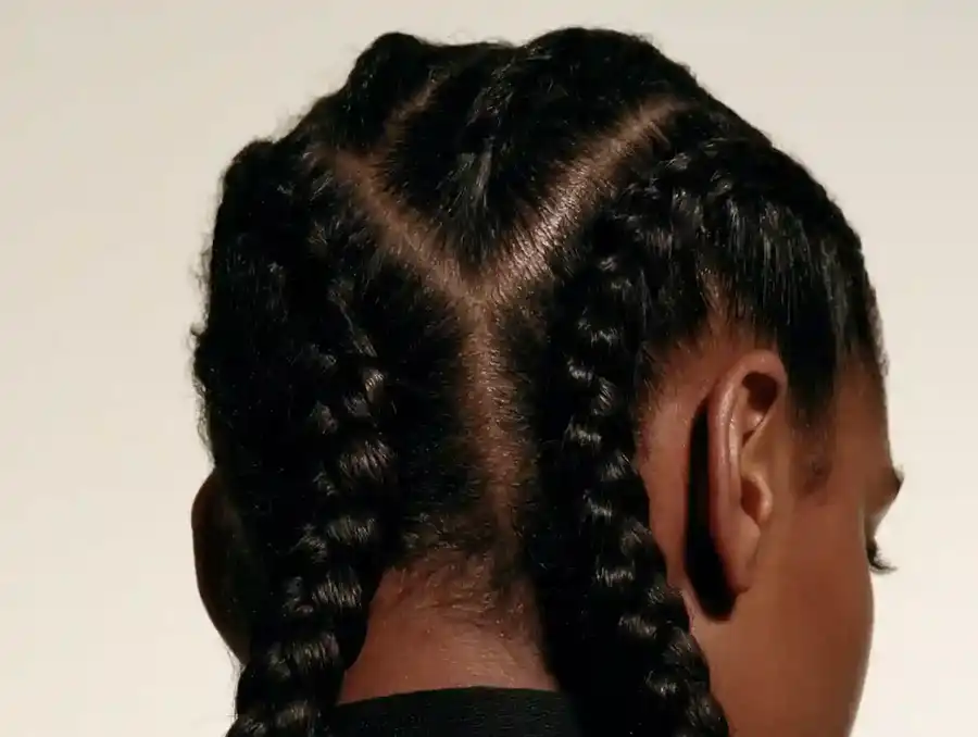 Back of the head with hair flattened into neat cornrows
