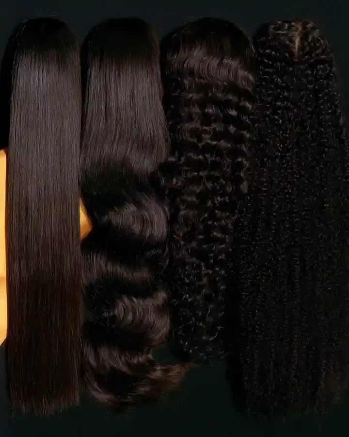 Hair lengths laid side by side on a dark surface, straight through to coiled
